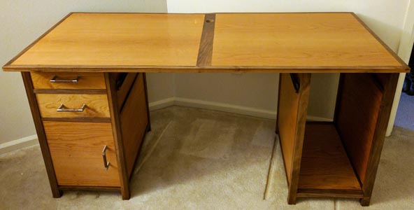 A computer desk made with walnut and cherry